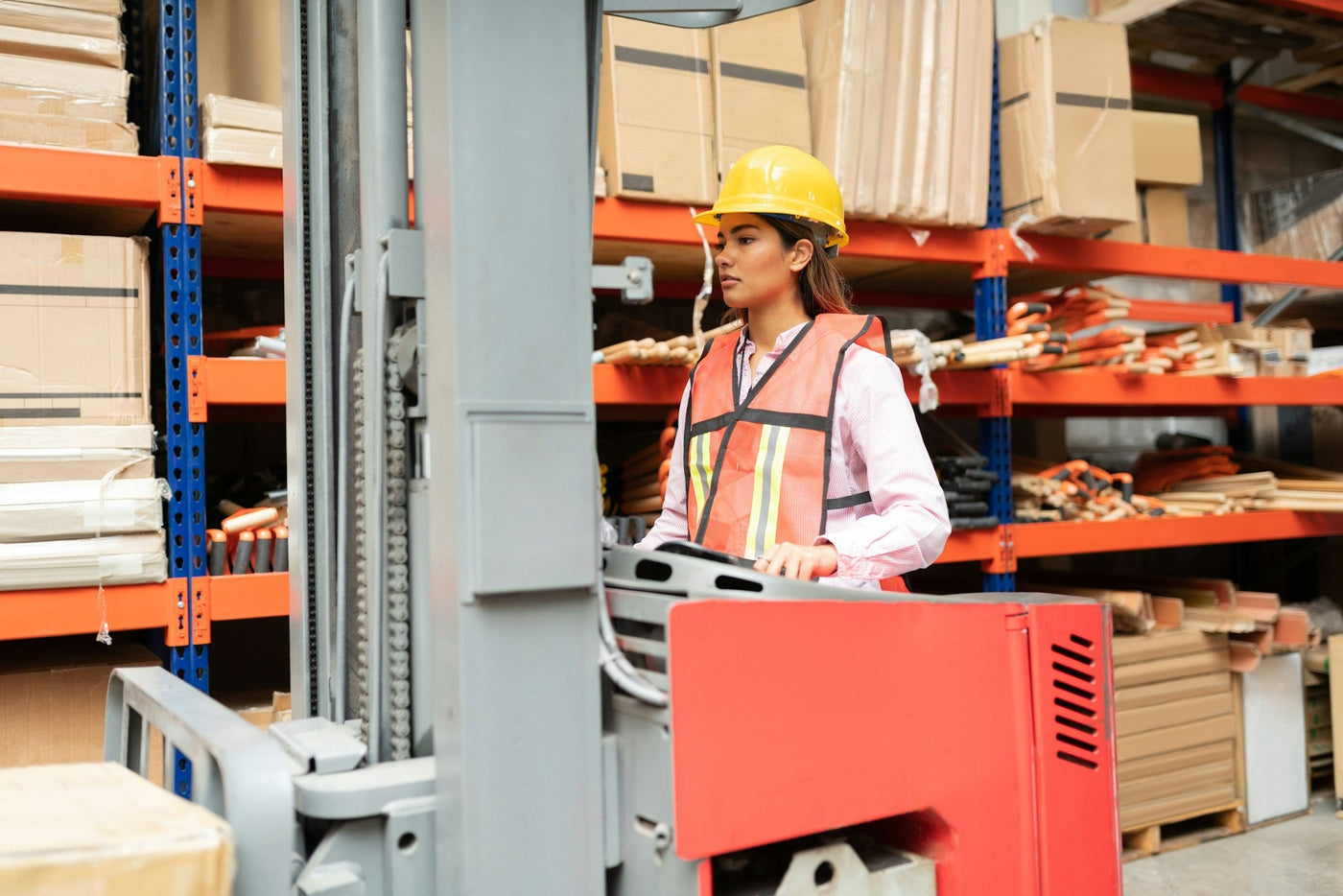 confident-female-supervisor-operating-forklift
